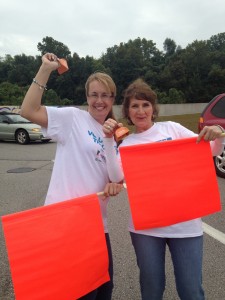 MRHFM employees cheer on their coworkers in Pedal the Cause. 